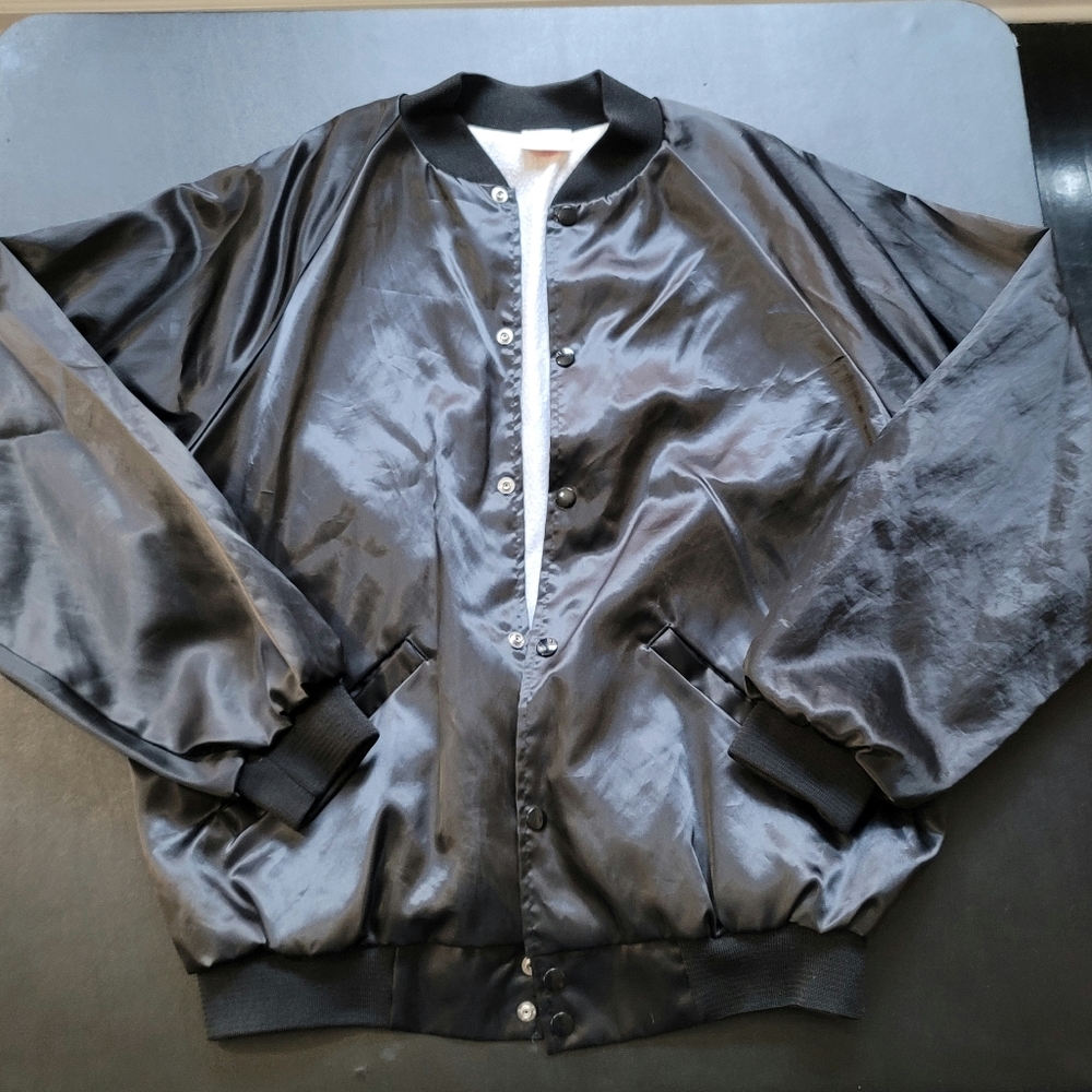 Vintage black Letterman jacket.
